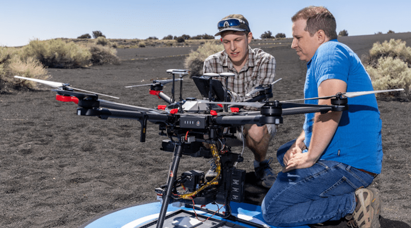 In support of their Mars research, Koeppel (left) and Edwards (right) conducted an analog study in a cinder field near Flagstaff, Ariz. At the Flagstaff study site, they collected data in the field and compared it with the data collected from the drones, simulating satellite imagery. CREDIT: Northern Arizona University