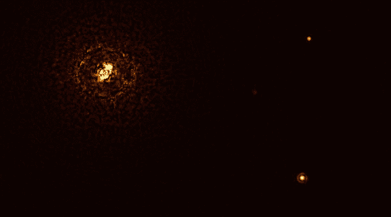 This image shows the most massive planet-hosting star pair to date, b Centauri, and its giant planet b Centauri b. This is the first time astronomers have directly observed a planet orbiting a star pair this massive and hot. The star pair, which has a total mass of at least six times that of the Sun, is the bright object in the top left corner of the image, the bright and dark rings around it being optical artefacts. The planet, visible as a bright dot in the lower right of the frame, is ten times as massive as Jupiter and orbits the pair at 100 times the distance Jupiter orbits the Sun. The other bright dot in the image (top right) is a background star. By taking different images at different times, astronomers were able to distinguish the planet from the background stars. The image was captured by the SPHERE instrument on ESO’s Very Large Telescope and using a coronagraph, which blocked the light from the massive star system and allowed astronomers to detect the faint planet. CREDIT: ESO/Janson et al.