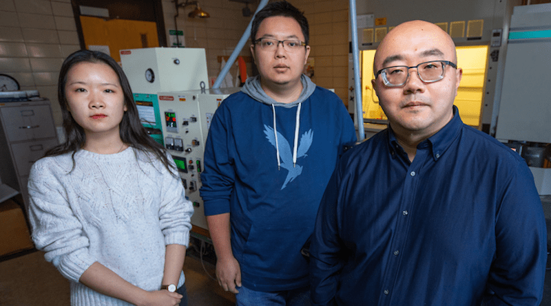 Iowa State chemical and biological engineers Yue Wu, professor, right, Xiaopeng Liu, doctoral student, left, and Fan Yang, postdoctoral research associate, center, are part of the team that's developed a catalyst that converts a greenhouse gas into chemicals used to make plastics and other materials. CREDIT: Photo by Christopher Gannon/Iowa State University