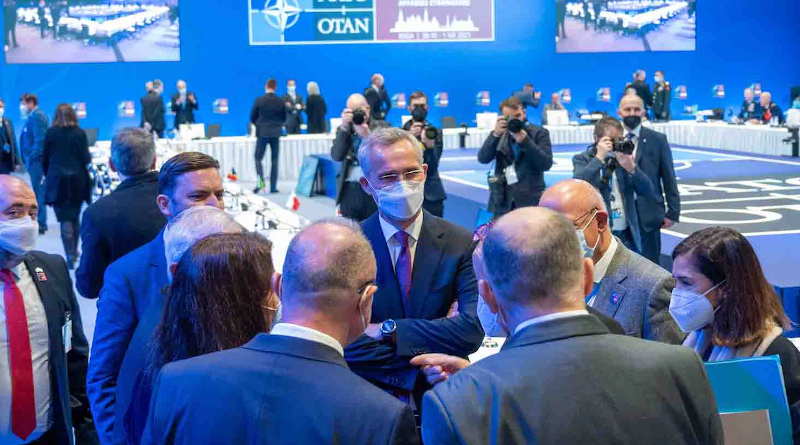 NATO Secretary General Jens Stoltenberg speaks with participants at the end of a session during the alliance's Foreign Ministers Meeting in Riga, Latvia. Photo Credit: NATO