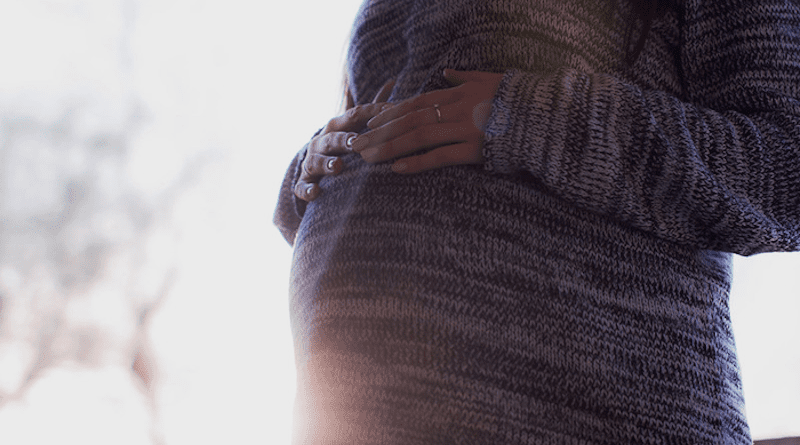 A pregnant woman. Photo Credit: freestocks.org, Flickr (CC0, https://creativecommons.org/licenses/cc0/1.0/)