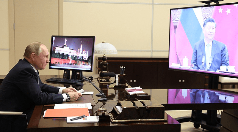 Russia's President Vladimir Putin talks with President of China Xi Jinping via videoconference. Photo Credit: Kremlin.ru