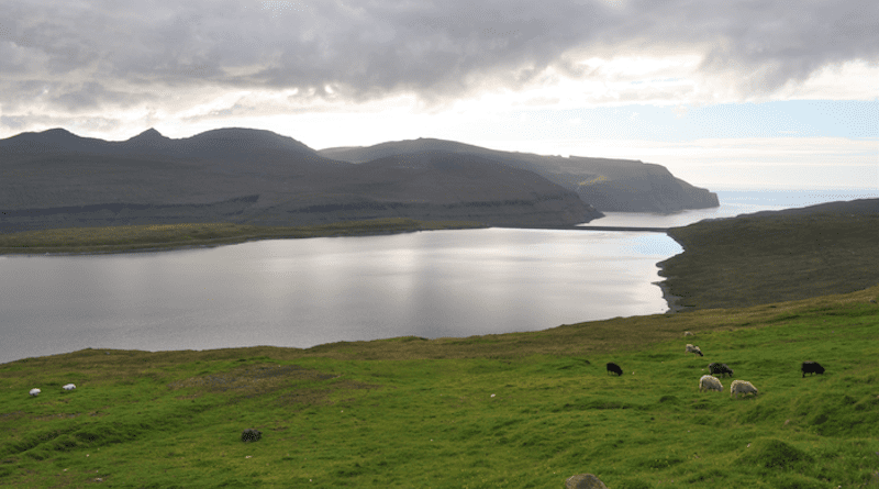 The bed of this lake on the island of Eysturoy contains a sediment layer laid down around 500 AD that documents the first arrival of sheep, and thus humans, on the archipelago. CREDIT: Raymond Bradley/UMass Amherst