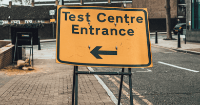 Sign to a COVID-19 test center in the U.K. CREDIT: Joshua Lawrence, Unsplash, CC0 (https://creativecommons.org/publicdomain/zero/1.0/)