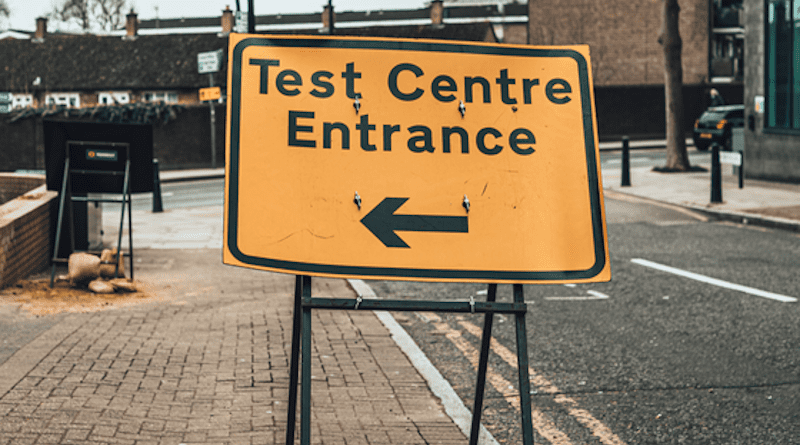 Sign to a COVID-19 test center in the U.K. CREDIT: Joshua Lawrence, Unsplash, CC0 (https://creativecommons.org/publicdomain/zero/1.0/)