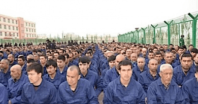 File photo of Uyghur detainees listening to speeches in a camp in Lop County, Xinjiang. Photo Credit: Wikipedia Commons