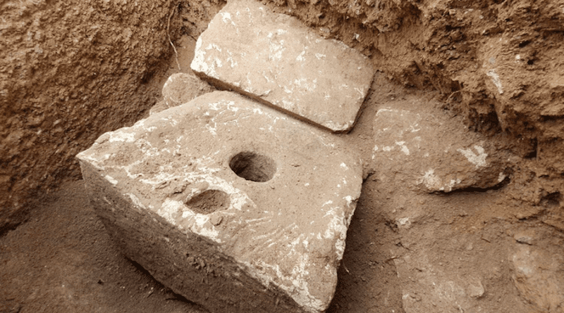 The 2700-year-old toilet seat made of stone. CREDIT: Yoli Schwartz, The Israel Antiquities Authority.