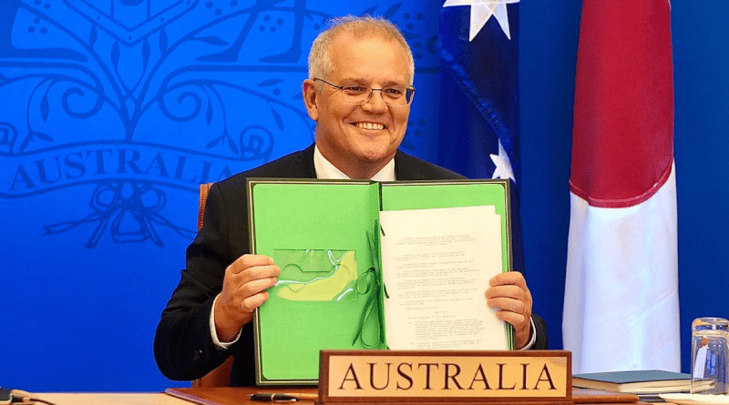 Australia's Prime Minister Scott Morrison shows signing of Reciprocal Access Agreement (RAA) with Japan. Photo Credit: Australia PM Office