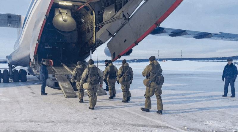 Russian servicemen board a military aircraft on their way to Kazakhstan, at an airfield outside Moscow on January 6. Photo Credit: Russia Defense Ministry