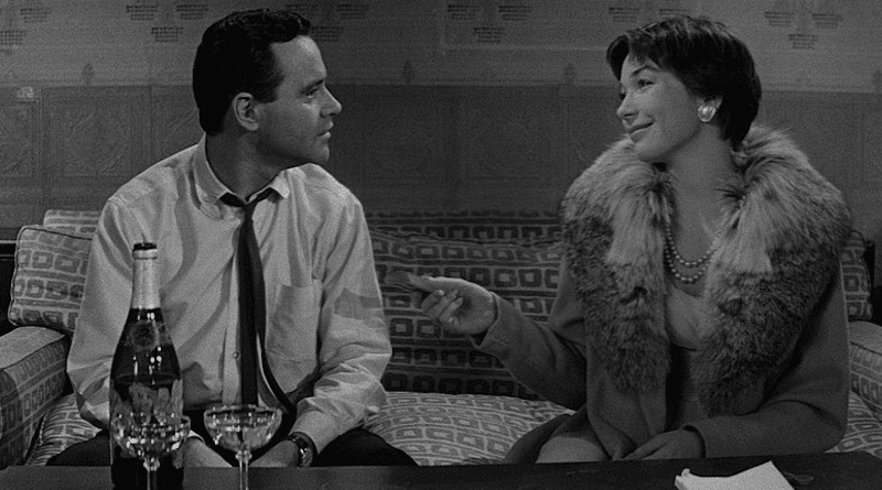 Calvin Clifford "Bud" Baxter (Jack Lemmon) and Fran Kubelik (Shirley MacLaine), in a still from the film's final scene: "Shut up and deal." Photo Credit: United Artists, Wikipedia Commons