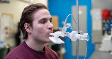 Michael D’Agostino demonstrates how a nebulizer would deliver an inhaled vaccine. A new study has found the McMaster-developed vaccine to be effective against variants of concern.
