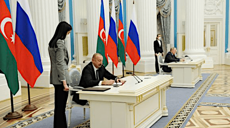 Presidents Ilham Aliyev (left) and Vladimir Putin sign the Azerbaijani-Russian military-technical agreement, Moscow, February 22 (Source: president.az)