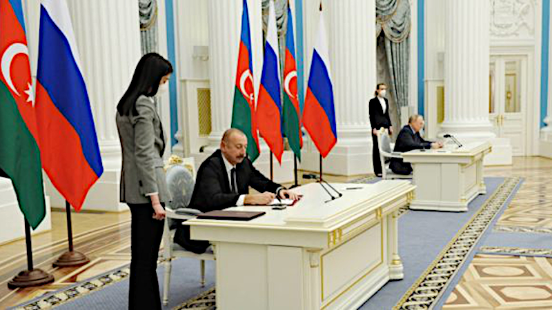 Presidents Ilham Aliyev (left) and Vladimir Putin sign the Azerbaijani-Russian military-technical agreement, Moscow, February 22 (Source: president.az)