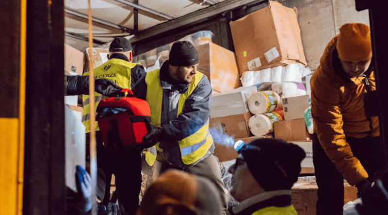 Polish Knights of Columbus unload a truck full of supplies for refugees fleeing Ukraine. | Knights of Columbus
