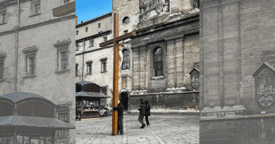 A man hugs a cross outside a monastery in Lviv, Ukraine, on Feb. 24, 2022, on the first day of Russia's invasion. Courtesy of Dennis Melnichuk