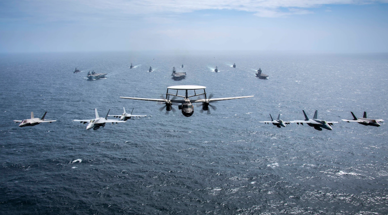 Ships and aircraft from U.S. Navy, Royal Navy, Japan Maritime Self-Defense Force, and Royal Australian Navy, led by USS Carl Vinson, HMS Queen Elizabeth, and JS Kaga, transit in formation during Maritime Partnership Exercise 2021, October 17, 2021, in Bay of Bengal (U.S. Navy/Haydn N. Smith)