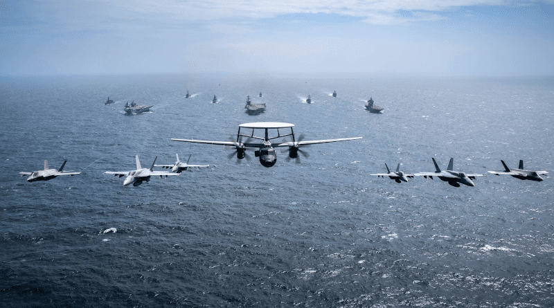 Ships and aircraft from U.S. Navy, Royal Navy, Japan Maritime Self-Defense Force, and Royal Australian Navy, led by USS Carl Vinson, HMS Queen Elizabeth, and JS Kaga, transit in formation during Maritime Partnership Exercise 2021, October 17, 2021, in Bay of Bengal (U.S. Navy/Haydn N. Smith)