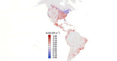 Map shows trends in levels of artificial light at night (ALAN) across the Western Hemisphere from 1992 to 2013. Pink and red dots show increases; blue dots show where light levels are decreasing. CREDIT: Graphic by Frank La Sorte, Cornell Lab of Ornithology.