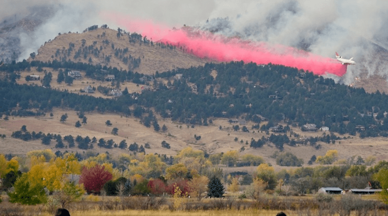 A DC-10 drops fire retardant on the edge of the 2020 Calwood Fire in Colorado. CREDIT: William Travis, University of Colorado