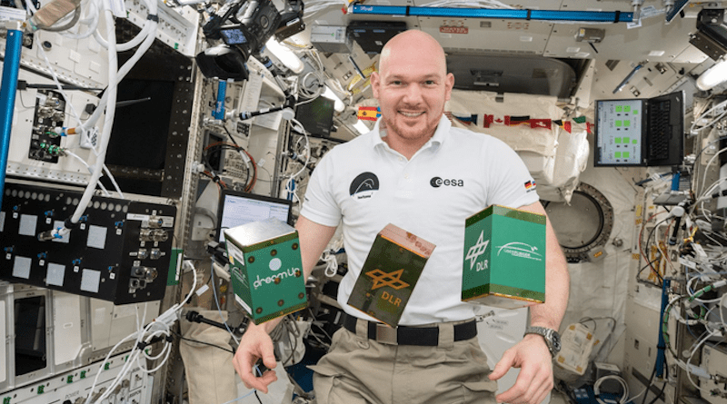 ESA (European Space Agency) astronaut Alexander Gerst with Nanoracks modules for EXCISS and two other investigations, ARISE and PAPELL. CREDIT: NASA
