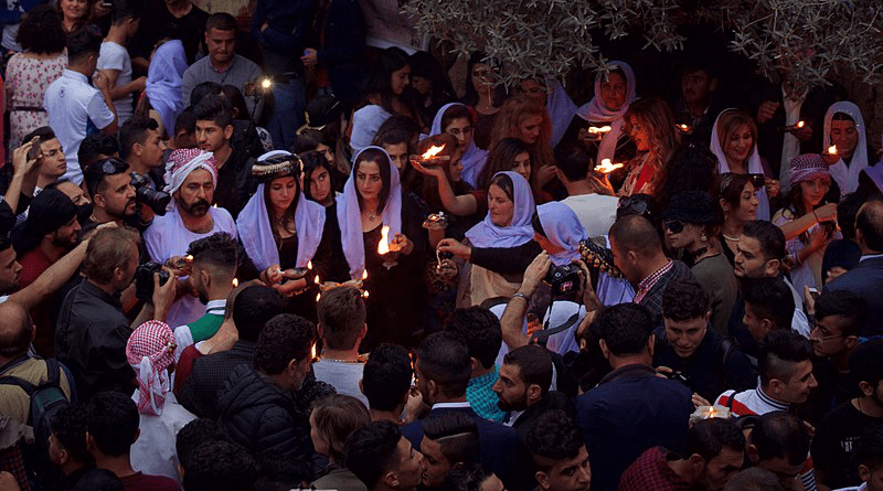 Pilgrims and festival at Lalish on the day of the Yazidi New Year in 2017, in Dohuk Governorate, Iraqi Kurdistan. Photo Credit: Levi Clancy, Wikipedia Commons