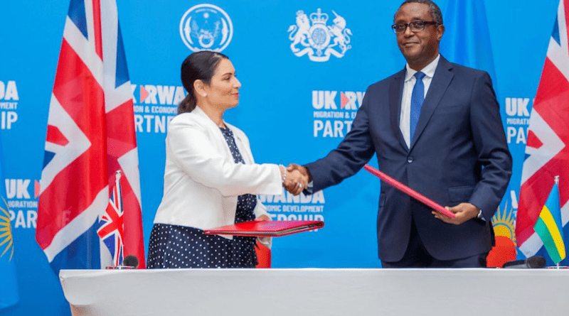 UK Home Secretary Priti Patel and Rwanda's Minister Vincent Biruta sign the migration and economic development partnership between the UK and Rwanda. Photo Credit: UK Home Office/Flickr
