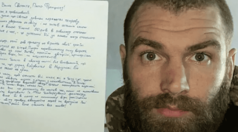 Major Serhiy Volyna, who has been leading the 36th marine brigade in the battle for the Ukrainian port city of Mariupol, with his letter to Pope Francis. Photo Credit: Religious Information Service of Ukraine