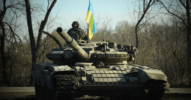 Ukrainian soldier and tank. Photo Credit: Ukraine Ministry of Defense
