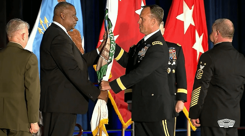 Secretary of Defense Lloyd J. Austin III passes the guidon of U.S. Central Command to Army Gen. Michael Eric Kurilla, April 1, 2022. Photo Credit: DOD Screencapture