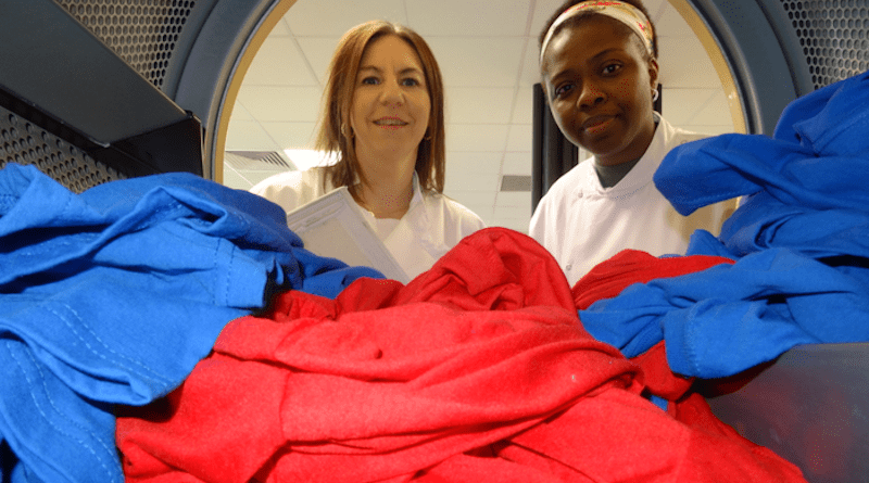 Test load in a tumble dryer - Dr Kelly Sheridan and PhD student Chimdia Kechi Okafor. CREDIT: P&G