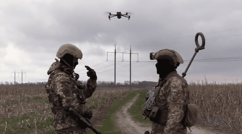 Ukrainian soldiers using drones to locate and destroy Russian landmines. Photo Credit: Ukraine Defense Ministry video screenshot