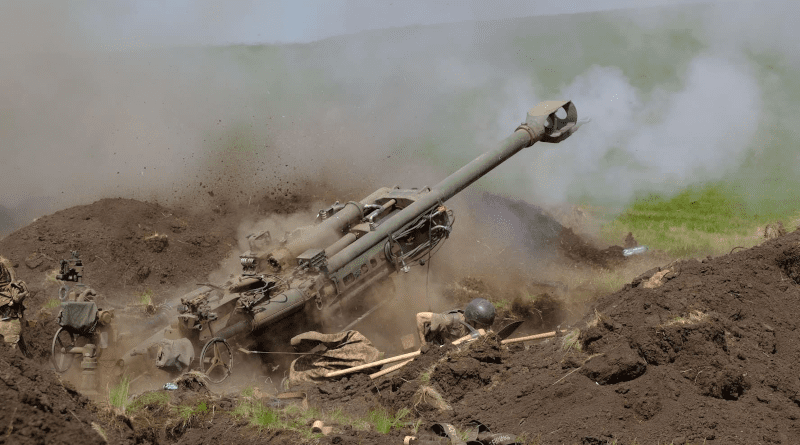 Ukrainian soldiers fire an M777 howitzer provided by the US. Photo Credit: Ukraine Defense Ministry