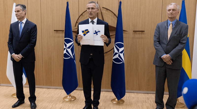 Finland's Ambassador to NATO Klaus Korhonen and Sweden's Ambassador to NATO Axel Wernhoff present NATO Secretary General Jens Stoltenberg official letters of application for their respective countries to join NATO. Photo Credit: NATO