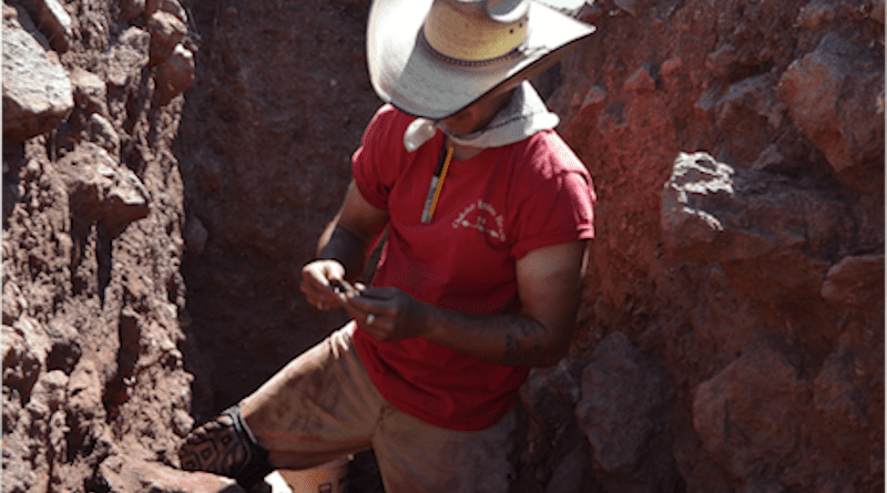 University of Wyoming Ph.D. student Chase Mahan inspects an artifact from excavation at the Powars II archaeological site in 2020. CREDIT: Spencer Pelton