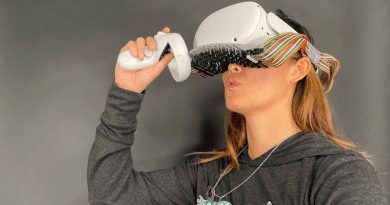Vivian Shen, a Ph.D. student in Carnegie Mellon University's Robotics Institute, uses a virtual reality headset equipped with a phased array of ultrasound transducers to simulate the feeling of drinking on her lips. CREDIT: Carnegie Mellon University