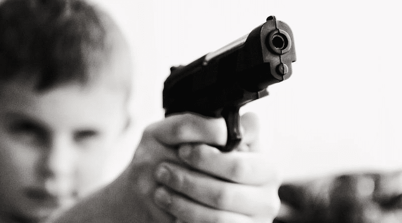 Child Holding A Gun Point Gun Point Pointing A Gun