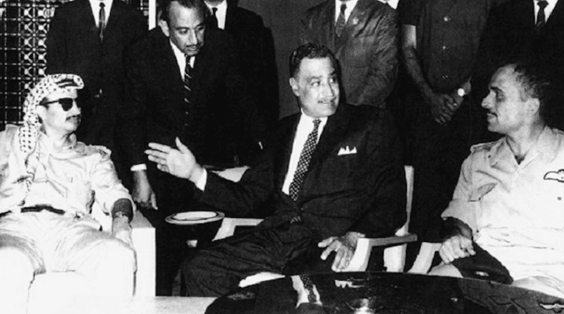 Egyptian President Gamal Abdel Nasser brokering an agreement to end the Black September conflict between Yasser Arafat (left) of the PLO and King Hussein (right) of Jordan. The negotiations are taking place at the Cairo Hilton. Photo Credit: Author unknown, Wikipedia Commons