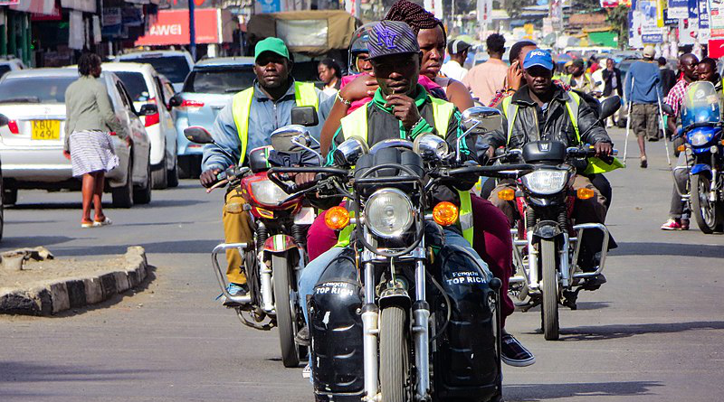 Boda boda motorists on the move in Nakuru, Kenya. Photo Credit: Victor Kibiwott, Wikipedia Commons