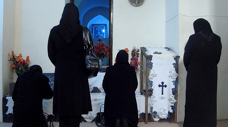 Assyrian Christian women praying in Mart Maryam Church in Urmia, Iran. Photo Credit: Ehsan Soleimanpour, Wikipedia Commons