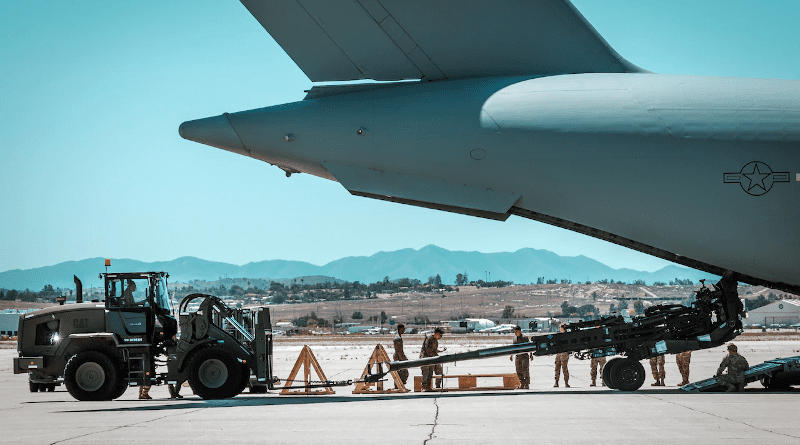 Marine Corps 155mm M777 towed howitzer is loaded into the back of an Air Force C-17 Globemaster III aircraft at March Air Reserve Base, Calif., April 24, 2022. The howitzers are included in U.S. and allied efforts to identify and provide Ukraine with additional capabilities. Photo Credit: Marine Corps Staff Sgt. Royce H. Dorman