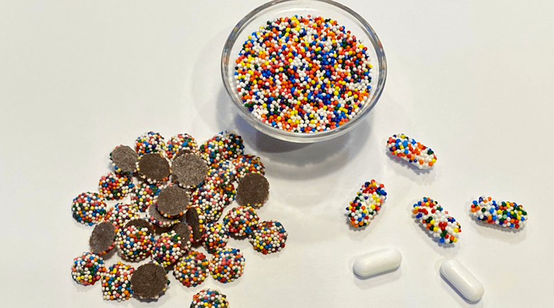 Chocolate drops covered with candy nonpareils (left), a bowl of colorful candy nonpareils (center), pharmaceutical caplets coated with nonpareils (right). CREDIT: William Grover/UCR