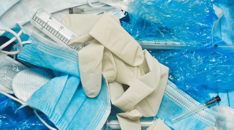 PPE in a medical waste bin CREDIT: ADELART / Shutterstock