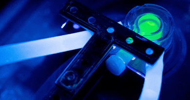 Mechanoluminescent material during an experiment at the University of Jena. CREDIT: (Image: Jens Meyer/University of Jena)