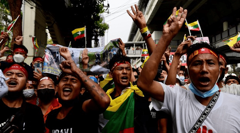 Burmese nationals chant slogans against their country’s junta during a rally outside the Myanmar Embassy in Bangkok to protest Naypyidaw’s execution of veteran democracy activist Ko Jimmy and three other political dissidents, July 26, 2022. Photo Credit: Subel Rai Bhandari/BenarNews