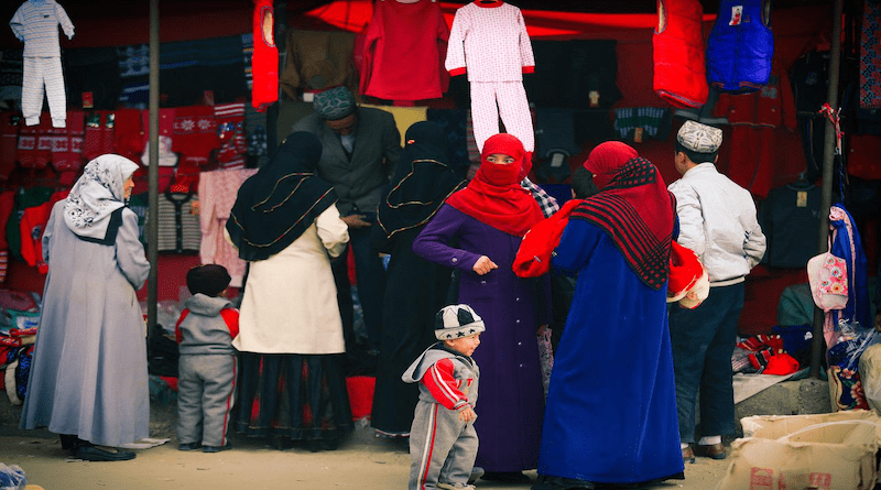 Uyghur Muslims in a market in Xinjiang, China
