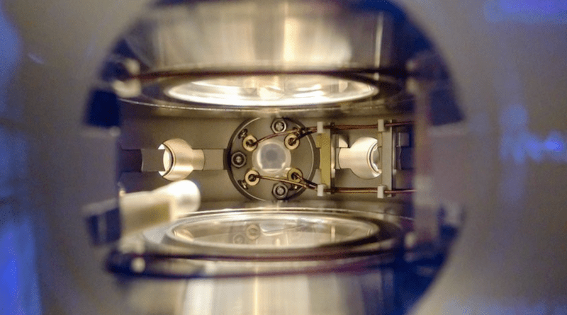 A close view inside the main vacuum chamber of the NaK molecules experiment. In the middle four high-voltage copper wires are routed to an ultrahigh-vacuum glasscell where the ultracold polar molecules were produced.