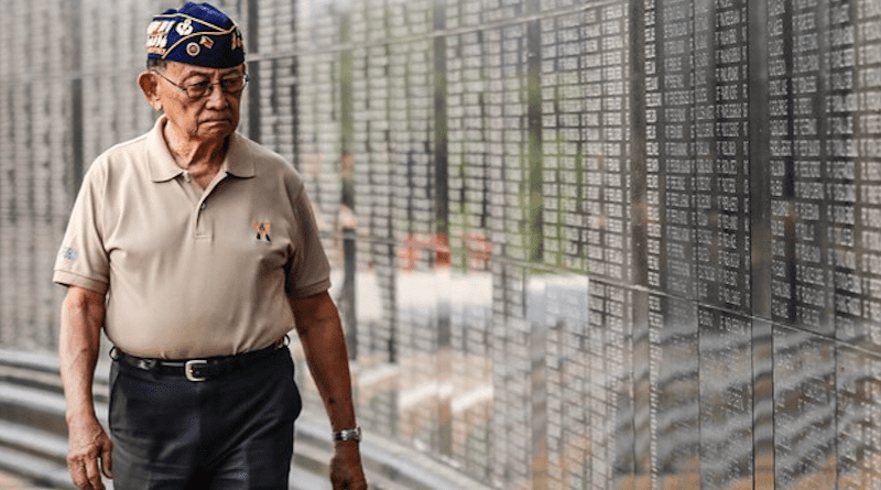 Former President Fidel V. Ramos looks at familiar names engraved on the “Wall of Heroes Memorial” at the Capas National Shrine, in Tarlac, Philippines, April 11, 2016. Jojo Riñoza/BenarNews