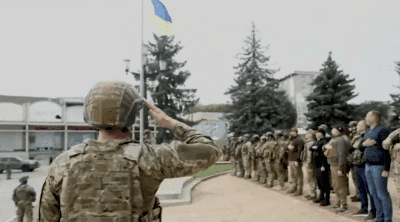 Ukrainian troops raise the country's flag in Balakliya, Kharkiv region. Photo Credit: Ukraine Ministry of Defense video screenshot