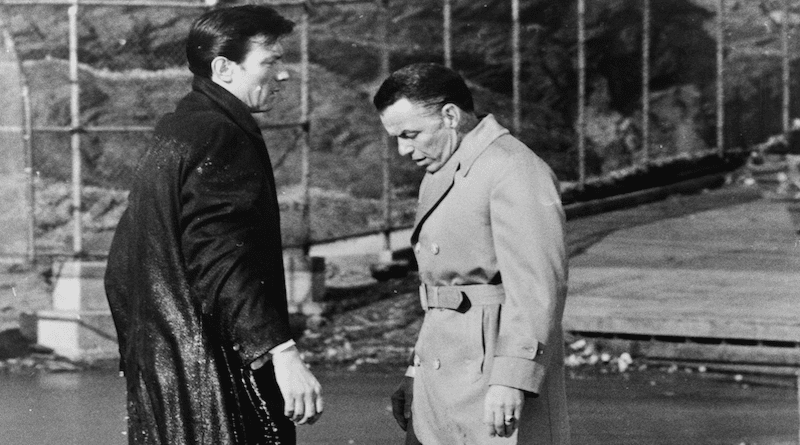 Laurence Harvey (left) and Frank Sinatra (right) filming a scene from The Manchurian Candidate in Central Park, New York. Harvey just walked off the pier. Photo Credit: Library of Congress, Wikipedia Commons