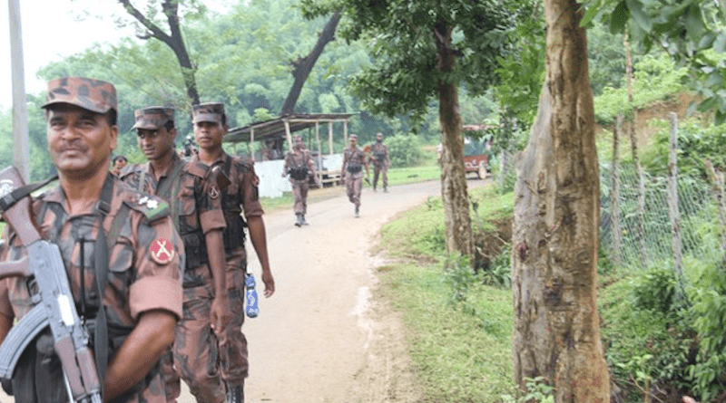 Members of the Border Guard Bangladesh (BGB) patrol near the Tombru crossing in Naikhongchari, a sub-district of southeastern Bandarban district, Sept. 1, 2022. [Sunil Barua/BenarNews]